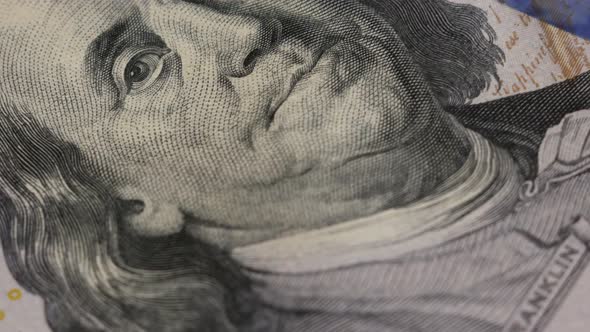 Close up portrait of the president of america on 100 dollar bills and cryptocurrency  alt