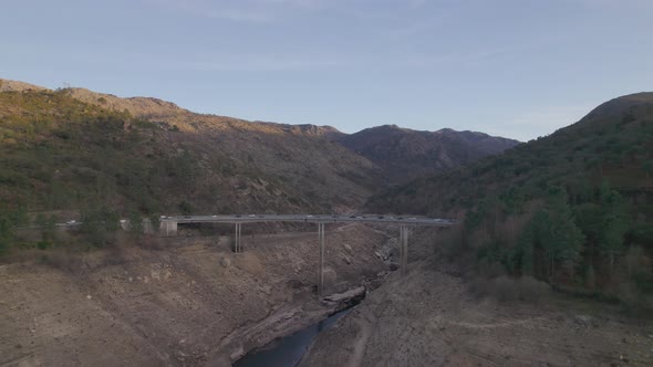Bridge Road Over Mountain River alt