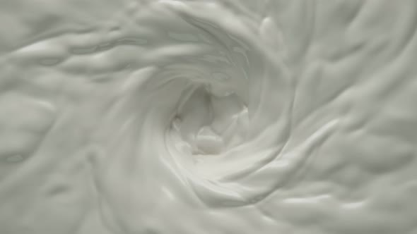 Super Slow Motion Shot of Fresh Cream Vortex at 1000 Fps alt