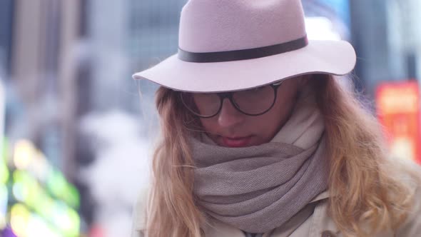 Girl At Time Square in New York alt
