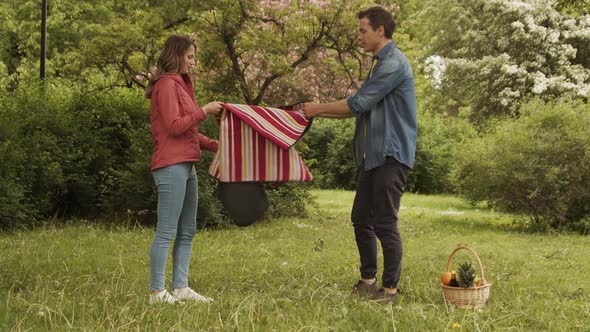 Workplace of freelance worker at home office. Young man works using computer. alt