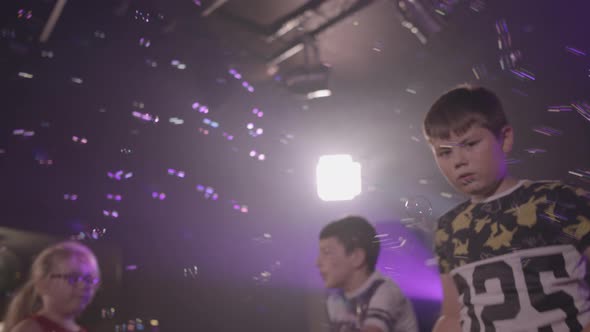 Kids Dance and Play With Bubbles at Children's Party - Ungraded alt