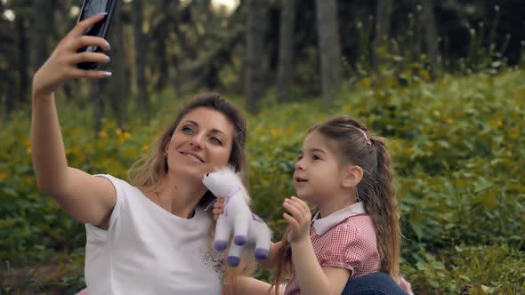 Mother's Day. Mother With Child Looking Cartoon. Family Make Video Call To Daddy. Happy Family. alt