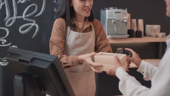 Buying Takeaway Coffee At Cafe alt