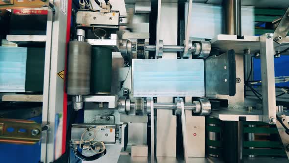 Face Mask Production Line at a Medical Mask Manufacturing Facility alt