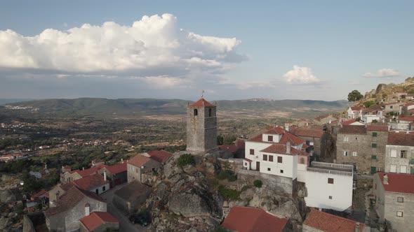 Beautiful perched Portuguese Monsanto village in Portugal. Aerial circling