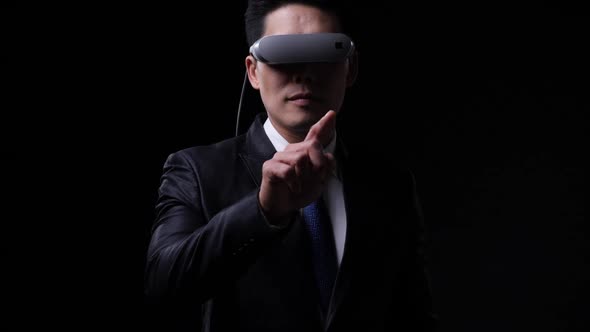 Business man wearing vr glasses and touching. alt
