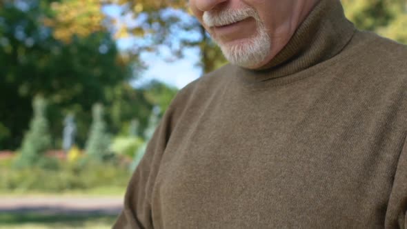 Aged Man Chatting by Smartphone Application, Typing Message Online, Technology