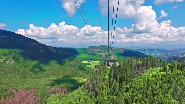Travel by cable car from Kasprowy Wierch in Tatra mountain, Poland alt