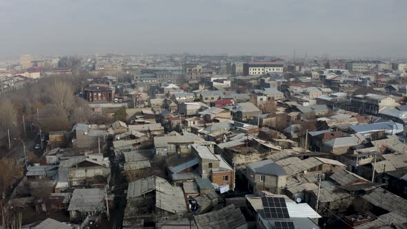 Aerial view buildings in soviet style town in eastern Asia.  alt