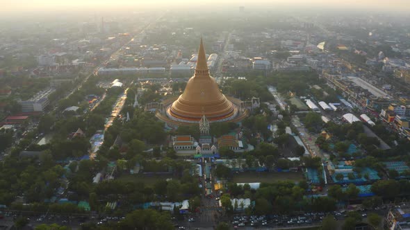 Aerial top view of Phra Pathommachedi temple at sunset in Nakorn Pathom district, Thailand. alt