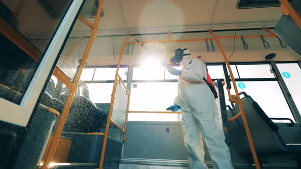 Coronavirus Prevention, Epidemic Concept, Sanitary Expert Is Using Chemical Substance  alt