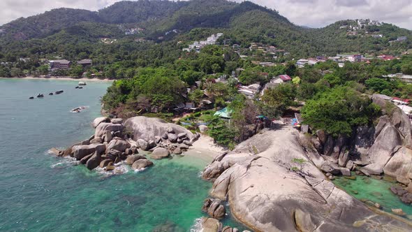 Beautiful 4K drone footage of the beach and unique rock features at Hin Ta Hin Yai Beach on Koh Samu alt