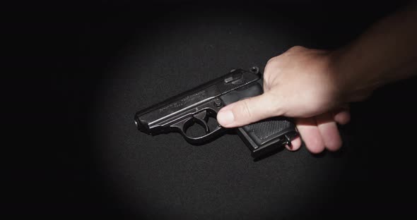 Picking Up a Gun alt