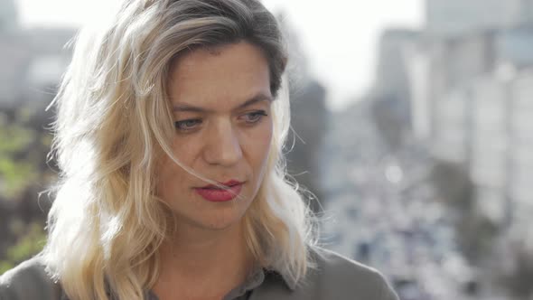 Depressed Mature Woman Looking Away Thoughtfully alt