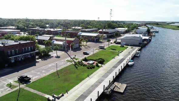 A View of the Apalachicola City Dock from the Apalachicola River in Apalachicola, Florida. alt