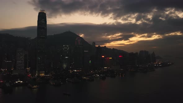 Modern Skyscrapers In Hong Kong City. buildings in Hong Kong city on sunrise. alt