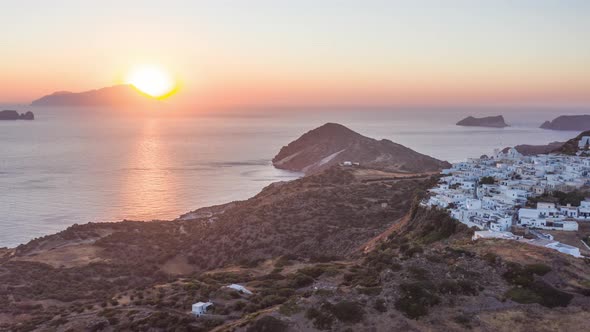 Hyper Lapse Aerial of Sunset Above Typicall Greek Village on Milos Island in Greece alt