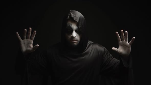 Dangerous Hell Demon Doing Magic Over Black Background alt