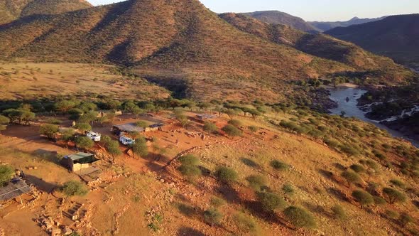 Campsite in waterfall Epupa Falls, Northern Namibia alt