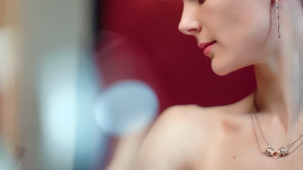 Sexy Woman with Perfect Skin Posing at Light Bokeh Background alt