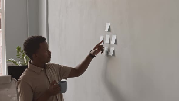 Businessman Brainstorming at Workplace alt