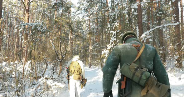 Group Of Reenactors Dressed As German Wehrmacht Infantry Soldiers In World War II Running With alt