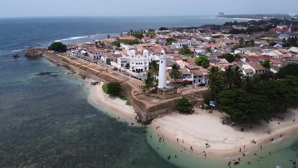 Aerial Footage of White Lighthouse in Galle Fort, Sri Lanka