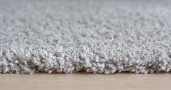 Grey carpet on the floor at home alt