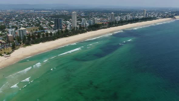 Spectacular aerial view of Burleigh to Broadbeach, Summers day, waves breaking  on golden beaches,pa alt