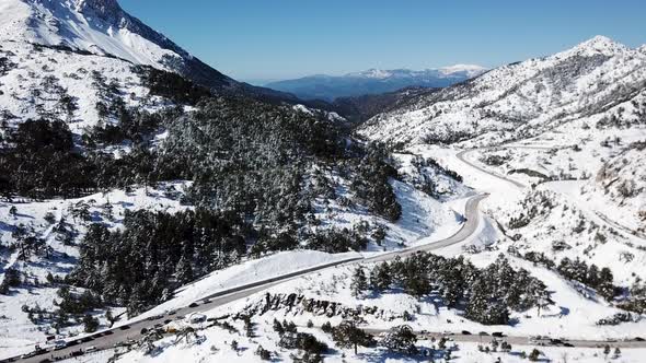 Moving over a snow covered mountain on a clear day