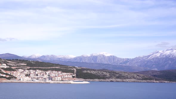 Panorama of the Lustica Bay Against the Background of Snowcapped Mountains alt