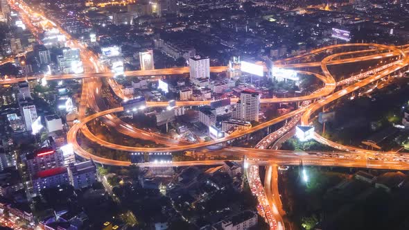 Timelapse of Bangkok city night view with main traffic high way,Thailand