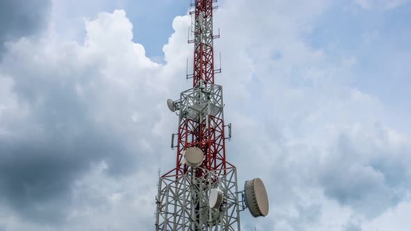 Time Lapse of Telecommunication Tower Against Sky and Clouds in Background alt