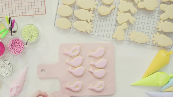 Step by step. Flat lay. Decorating Easter sugar cookies with royal icing alt