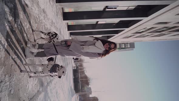 Girl Funny Walking with the Dogs alt