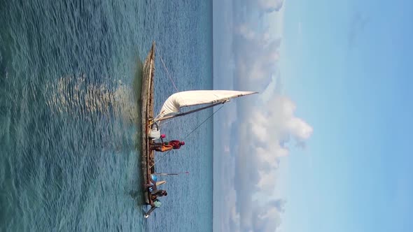 Tanzania Vertical Video  Boat Boats in the Ocean Near the Coast of Zanzibar Aerial View alt