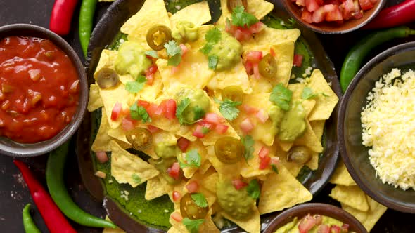 Fresh Yellow Corn Nacho Chips on Ceramic Plate alt