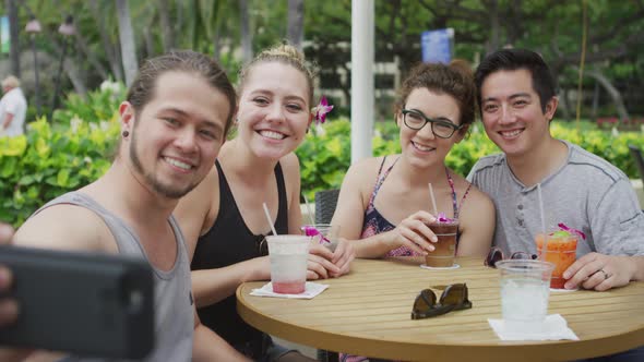 Group of friends in Hawaii take a selfie together