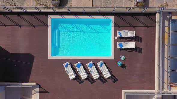 Luxury Pool on the Roof of the House with Sun Loungers and Towels for Tourists to Relax with Clear
