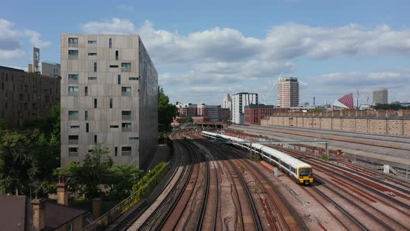 Forward Tracking of Passenger Train Driving on Multi Track Railway Line Leading Around Modern alt