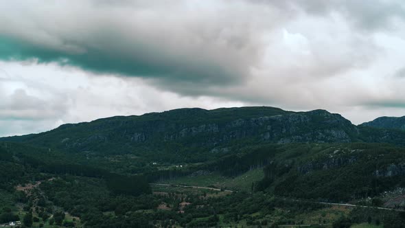 Timelapse of cloudsing over a mountain, majestic view and dark skies and insane cloudement alt