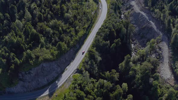 Aerial of a Truck Driving Down, Llancahue, Hornopiren at Austral, Route 7, Chile, South America alt