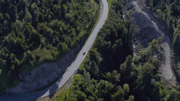 Aerial of a Truck Driving Down, Llancahue, Hornopiren at Austral, Route 7, Chile, South America