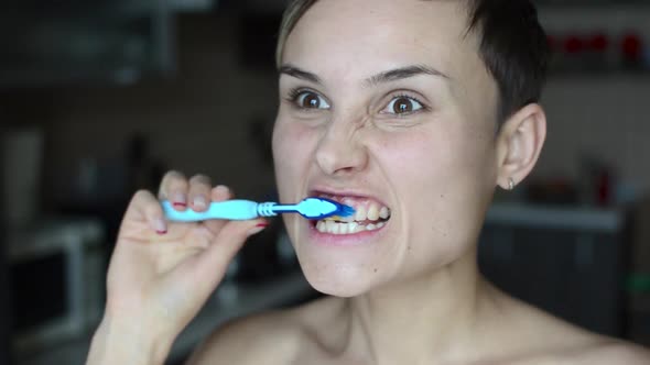 Woman Brush Her Teeth