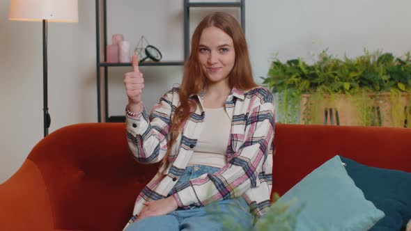 Cheerful Positive Showing Thumbs Up Nodding in Approval Successful Good Job Work at Home in Room alt