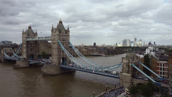 Drone View of the Tower Bridge in Cloudy Weather While Cars are Moving