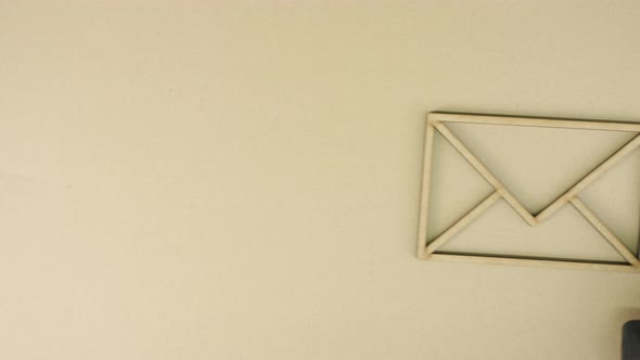 Application Form and the Envelope Icon on Cardboard Background alt