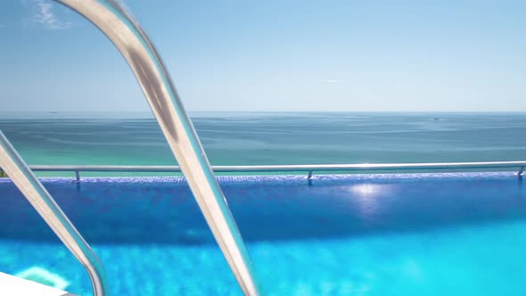 Hotel Swimming Pool with Sunny Reflections Timelapse Sesimbra Portugal alt