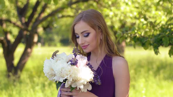 Caucasian Blonde Woman with a Bouquet of Flowers